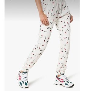 Adam Selman adorable sweatpants with pink and red rose print